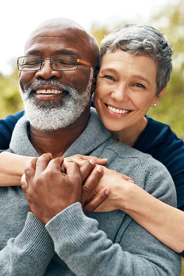 CJC-1295-Peptide-Treatment A mature couple embraces outside. Get CJC 1295 anti-aging peptides from Balanced Medical Solutions in San Francisco Bay Area.