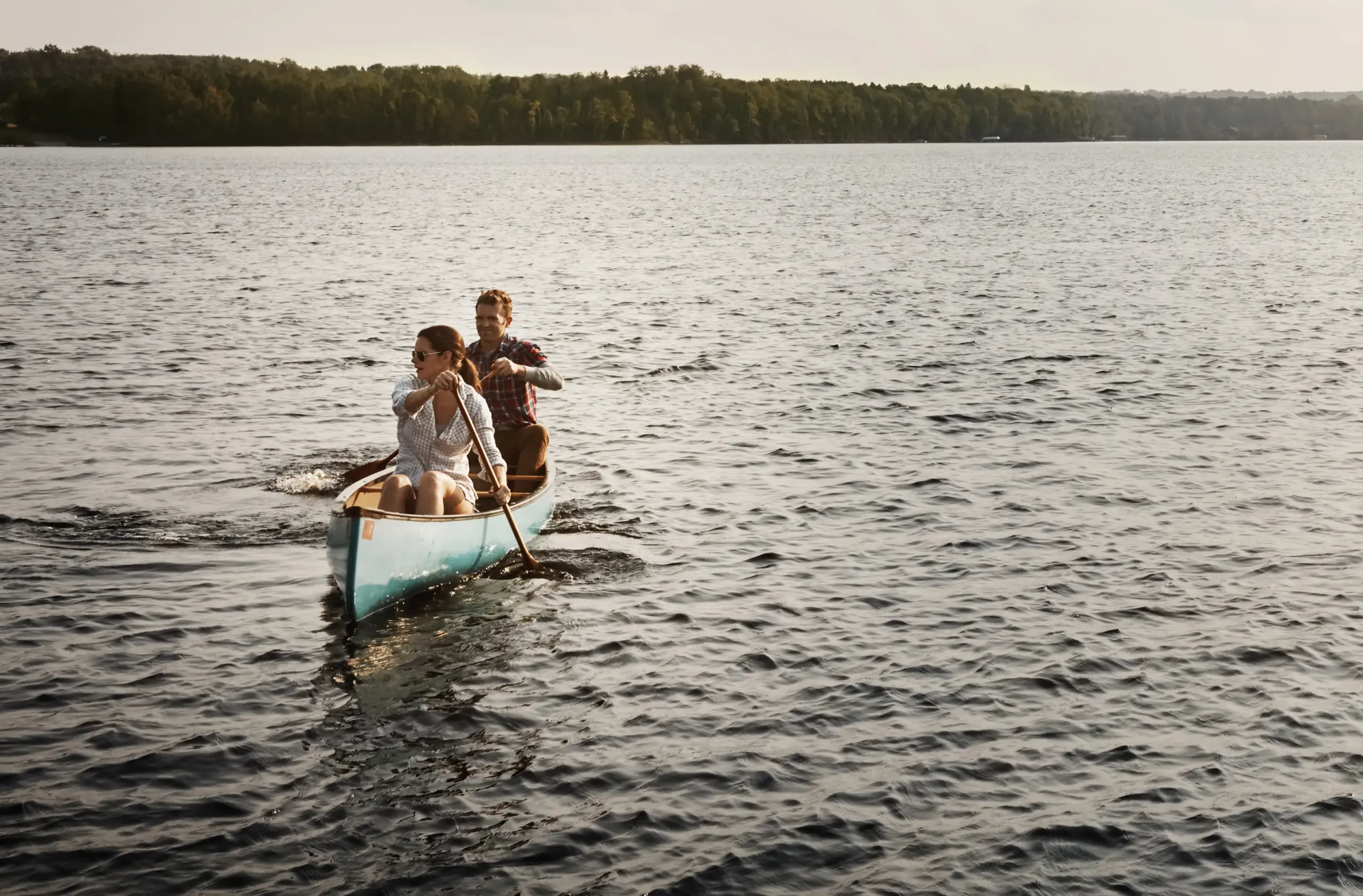 A couple takes a canoe out on a lake. Get HGH hormone therapy from Balanced Medical Solutions in San Francisco Bay Area.