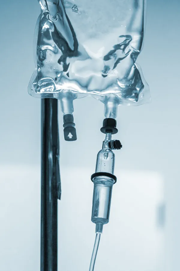 Regenerative-Exosome-IV-Therapy-Treatment Close-up of an IV bag and drip. Get regenerative exosome IV therapy from Balanced Medical Solutions in San Francisco Bay Area.